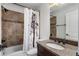 Bathroom featuring a vanity and a shower-tub combo at 3301 Chastain Ridge Dr, Marietta, GA 30066