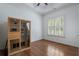 Empty bedroom with hardwood floors, tray ceiling, and a sauna at 3301 Chastain Ridge Dr, Marietta, GA 30066