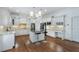 Beautiful kitchen with white cabinets, granite countertops, stainless steel appliances, and a center island with seating at 3301 Chastain Ridge Dr, Marietta, GA 30066
