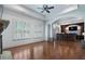 Spacious living room boasts a stone fireplace, hardwood floors, and a wet bar at 3301 Chastain Ridge Dr, Marietta, GA 30066