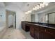 A spacious bathroom with double sinks, a marble floor, and a separate tub at 3301 Chastain Ridge Dr, Marietta, GA 30066