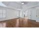Spacious main bedroom with hardwood floors and ensuite bathroom featuring double doors at 3301 Chastain Ridge Dr, Marietta, GA 30066