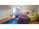 Spacious bonus room with bean bag chairs and a comfortable couch at 4135 Creekwood Dr, Cumming, GA 30041