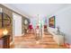 Sunlit dining room with hardwood floors and stylish decor at 4135 Creekwood Dr, Cumming, GA 30041