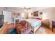 Cozy main bedroom with hardwood floors, fireplace and ensuite bathroom at 4135 Creekwood Dr, Cumming, GA 30041