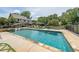 Outdoor pool with lounge chairs and umbrellas, great for relaxation and entertainment at 4135 Creekwood Dr, Cumming, GA 30041