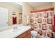 Cozy bathroom with a vanity, mirror, and a shower-tub combination at 4549 Clarks Creek Ter, Ellenwood, GA 30294