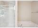 Closeup of tub and shower area with glass door at 4549 Clarks Creek Ter, Ellenwood, GA 30294