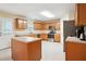 The kitchen boasts stainless steel appliances and wooden cabinetry at 4549 Clarks Creek Ter, Ellenwood, GA 30294