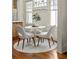 Bright dining area with a round table setting near the kitchen, creating an inviting and airy space at 1290 Mclendon Ne Ave, Atlanta, GA 30307