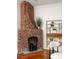 Cozy fireplace with custom built-ins and shelving, adding warmth and charm to the space at 1290 Mclendon Ne Ave, Atlanta, GA 30307