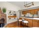 The kitchen showcases custom built-ins, and stainless appliances, blended with a brick fireplace at 1290 Mclendon Ne Ave, Atlanta, GA 30307