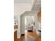 View into the kitchen showcasing modern appliances, custom cabinets, and hardwood floors, a timeless and inviting space at 1290 Mclendon Ne Ave, Atlanta, GA 30307