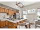 Spacious kitchen featuring an island with seating, modern appliances, and ample cabinet space at 1290 Mclendon Ne Ave, Atlanta, GA 30307