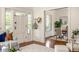Bright and airy living room featuring hardwood floors, lots of natural light, and an inviting seating area at 1290 Mclendon Ne Ave, Atlanta, GA 30307