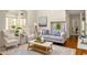 Comfortable living room with neutral colors, cozy furniture, and lots of natural light at 1290 Mclendon Ne Ave, Atlanta, GA 30307