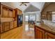 Traditional kitchen with wooden cabinets, granite countertops, and stainless steel appliances at 15 Walnut Ridge Way, Covington, GA 30014