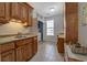 Laundry room with sink and plenty of cabinetry and counter space at 15 Walnut Ridge Way, Covington, GA 30014
