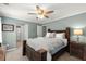 A spacious bedroom with a large bed, soft lighting, and serene colors, perfect for restful nights at 214 Crestmont Way, Canton, GA 30114