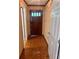 A foyer with wooden door and wood-patterned floor at 4380 Highway 138, Oxford, GA 30054