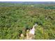 Aerial view of lot with home and surrounding trees at 1016 Green Dr, Canton, GA 30114