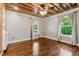 Large bedroom featuring hardwood floors and light gray walls at 1016 Green Dr, Canton, GA 30114