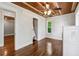 Bedroom featuring hardwood floors and large window with natural lighting and closet at 1016 Green Dr, Canton, GA 30114