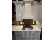 Modern kitchen features stone countertops, custom range hood, and a gas range at 1016 Green Dr, Canton, GA 30114