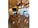 Living Room featuring a fireplace, hardwood floors, and a ceiling fan at 1016 Green Dr, Canton, GA 30114