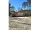 Large outbuilding for parking and projects with some play equipment off to the side at 1016 Green Dr, Canton, GA 30114