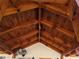 Wood vaulted ceiling detail on the covered front porch with an outdoor ceiling fan at 1016 Green Dr, Canton, GA 30114