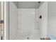 Bright shower with fresh white finish and built in shelves at 1016 Green Dr, Canton, GA 30114
