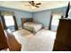 Comfortable bedroom featuring windows with modern cabinets and soft carpet at 19 Magnolia Ne Ct, Rydal, GA 30171