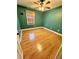 Cozy bedroom with laminate flooring, a ceiling fan, and window with curtains at 19 Magnolia Ne Ct, Rydal, GA 30171