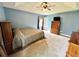 Spacious bedroom featuring neutral walls, carpet floors, and a ceiling fan at 19 Magnolia Ne Ct, Rydal, GA 30171