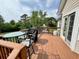 Inviting backyard deck featuring outdoor seating, a grill, and views of the yard at 19 Magnolia Ne Ct, Rydal, GA 30171