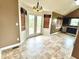 Eat-in kitchen with stainless steel appliances and access to deck at 19 Magnolia Ne Ct, Rydal, GA 30171