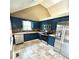 Kitchen with blue cabinets, stainless steel appliances, and light countertops at 19 Magnolia Ne Ct, Rydal, GA 30171