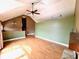 Bright living room with vaulted ceilings, hardwood floors, and unique chandelier at 19 Magnolia Ne Ct, Rydal, GA 30171