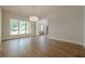 Dining area with large windows and hardwood floors at 2555 Chattahoochee Ln, Cumming, GA 30041