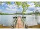 Private boat dock on the water with a swim platform and stunning lake views at 2555 Chattahoochee Ln, Cumming, GA 30041