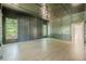 Spacious office featuring custom paneled walls and ceiling and two bright windows at 2555 Chattahoochee Ln, Cumming, GA 30041