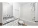Bathroom with a shower-tub and granite countertops at 4457 Watson Ridge Dr, Stone Mountain, GA 30083
