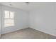 Bedroom with a large window and neutral carpet at 4457 Watson Ridge Dr, Stone Mountain, GA 30083