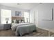 Bedroom with carpet, windows, and soft lighting at 4457 Watson Ridge Dr, Stone Mountain, GA 30083