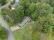 Home nestled among the lush greenery from a bird's-eye view at 4934 Pickys Se Holw, Acworth, GA 30102