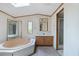 Bathroom with a large soaking tub, vanity, and separate shower at 4934 Pickys Se Holw, Acworth, GA 30102
