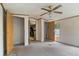 Bedroom featuring carpet, dual closets, and windows overlooking the greenery outside at 4934 Pickys Se Holw, Acworth, GA 30102