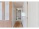 Hallway with painted walls and wood-paneled accents leading to other rooms in the home at 4934 Pickys Se Holw, Acworth, GA 30102