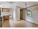 Kitchen with tile flooring, wood cabinetry, and space for a dining table to enjoy meals at 4934 Pickys Se Holw, Acworth, GA 30102